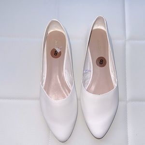 White leather flats